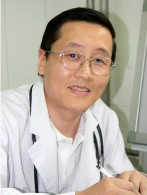 薛明