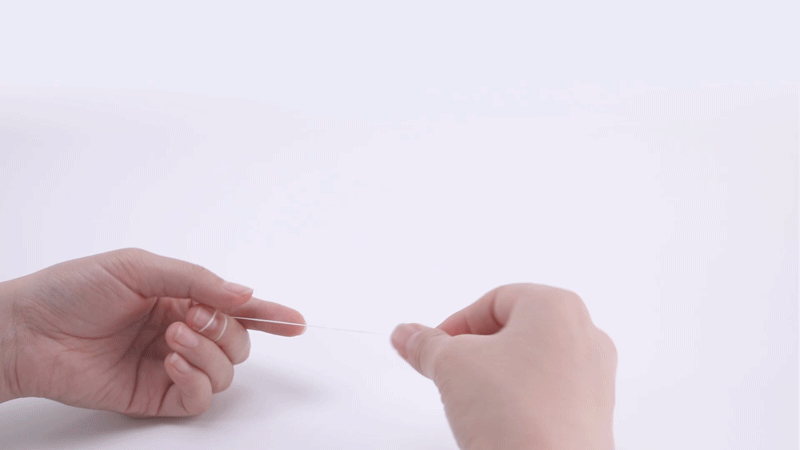 滚轴式牙线使用方法-执线-距离长约1-2cm.gif
